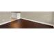 Flex room featuring hardwood flooring, a kitchenette, and ample space for various uses at 3249 Sandy Shore Ln, Kissimmee, FL 34743