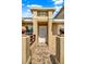 Well-maintained front entrance with decorative tiling leading to the unit's front door and porch at 3249 Sandy Shore Ln, Kissimmee, FL 34743