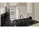Kitchen with stainless steel sink and a view to the outside at 3249 Sandy Shore Ln, Kissimmee, FL 34743