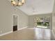 Spacious living room with tile floors and sliding glass doors leading to the outside at 3249 Sandy Shore Ln, Kissimmee, FL 34743