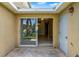 View from patio offers a glimpse into the living space, complemented by outdoor access at 3249 Sandy Shore Ln, Kissimmee, FL 34743