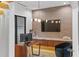 Stylish office with custom desk, designer wall, and elegant lighting at 33 Eastwind Ln, Maitland, FL 32751