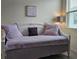 Comfortable bedroom with a daybed, soft lighting, and a window view at 3371 Yellowtop Loop, Clermont, FL 34714