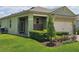 Attractive single-Gathering house with manicured lawn and shrubbery, and a brick-accented entry at 3371 Yellowtop Loop, Clermont, FL 34714