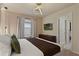 Well-appointed bedroom with a comfortable queen bed, contemporary lighting, and modern decor at 3715 Lana Ave, Davenport, FL 33897