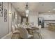 Dining area featuring elegant lighting and modern artwork at 3715 Lana Ave, Davenport, FL 33897