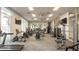 Well-equipped fitness center with modern exercise machines, large windows, and ample space for workouts at 3715 Lana Ave, Davenport, FL 33897