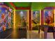 Fun game room featuring a ping pong table and foosball table, walls adorned with playful Mario decor at 3715 Lana Ave, Davenport, FL 33897