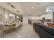 Open concept kitchen and living area with island seating at 3715 Lana Ave, Davenport, FL 33897