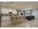 Modern kitchen with center island and stainless steel appliances at 3715 Lana Ave, Davenport, FL 33897