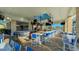 Outdoor bar with seating for many with multiple televisions for everyone to enjoy at 3715 Lana Ave, Davenport, FL 33897