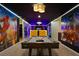 Spacious recreation room featuring pool table and Marvel superhero themed decorations at 3715 Lana Ave, Davenport, FL 33897