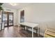 Dining area with access to the backyard and a white table at 3816 Tram Ct, Orlando, FL 32810