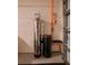 Water filtration system components installed in the basement of a modern home at 391 Cape Honeysuckle Pl, Sanford, FL 32771