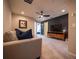 Cozy bonus room with comfortable seating and entertainment center at 391 Cape Honeysuckle Pl, Sanford, FL 32771