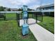 Well-maintained community dog park with a waste station, promoting a clean and pet-friendly environment at 391 Cape Honeysuckle Pl, Sanford, FL 32771