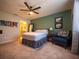 Serene main bedroom with ensuite bathroom access and minimalist decor at 391 Cape Honeysuckle Pl, Sanford, FL 32771