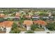 Neighborhood aerial view of a beautiful community with well-maintained landscaping at 4080 Oaktree Dr, Davenport, FL 33837