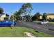 Parking lot with well-maintained landscaping and parking spaces at 4596 Pheasant Run Dr # C, Orlando, FL 32808