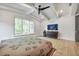 Spacious bedroom with coffered ceilings, hardwood floors, and a large window at 521 S Phelps Ave, Winter Park, FL 32789