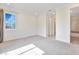 Spacious bedroom with good natural light and an adjoining bathroom at 521 S Phelps Ave, Winter Park, FL 32789