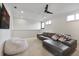 Spacious living area with comfortable seating, soft carpet, and good natural light at 521 S Phelps Ave, Winter Park, FL 32789