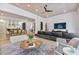 Spacious open-concept living area that integrates the living room, dining area, and kitchen seamlessly at 521 S Phelps Ave, Winter Park, FL 32789