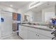 A spacious bathroom with double sinks, granite countertops, and a glass shower at 5234 Bear Corn Run, Port Orange, FL 32128