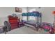 Bright bedroom with a bunk bed, a wooden dresser, and carpet flooring at 5234 Bear Corn Run, Port Orange, FL 32128