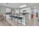 Modern kitchen featuring a breakfast bar with seating and stainless steel appliances and ample counter space at 5234 Bear Corn Run, Port Orange, FL 32128