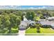 Aerial view of a well-maintained home surrounded by lush trees and landscaping at 623 Tuskawilla Point Ln, Winter Springs, FL 32708