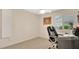 Cozy bedroom featuring a comfortable carpet and a built-in desk ideal for work or study at 623 Tuskawilla Point Ln, Winter Springs, FL 32708