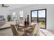 Bright dining area features sliding glass doors and offers an inviting space for gatherings at 6419 Chorus Dr, Mascotte, FL 34753