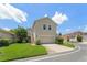 Charming two-story home with attached garage and lush lawn at 7003 Cupseed Ln, Harmony, FL 34773