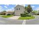 Beautiful two-story home with a large garage and well-manicured lawn at 7003 Cupseed Ln, Harmony, FL 34773