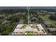 Aerial view of complex highlighting the layout, landscaping, parking, and pool within a well-maintained community at 758 E Michigan St # 203, Orlando, FL 32806