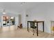 Bright dining area featuring modern flooring, neutral walls, and access to the outdoor patio at 758 E Michigan St # 203, Orlando, FL 32806