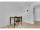 Bright dining area featuring modern flooring, neutral walls, and a modern dining table at 758 E Michigan St # 203, Orlando, FL 32806