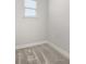 Bedroom featuring carpeting, baseboards, and a window at 7724 Sweet Star Ave, Orlando, FL 32836
