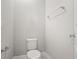 A toilet room with a towel rack and toilet paper holder at 7724 Sweet Star Ave, Orlando, FL 32836