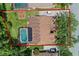 Aerial shot of the property shows pool, yard, and proximity to neighborhood amenities at 824 Spring Island Way, Orlando, FL 32828