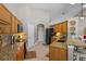Spacious kitchen with granite countertops, stainless steel appliances, and ample cabinet space at 824 Spring Island Way, Orlando, FL 32828