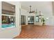 Expansive outdoor patio featuring tiled floors, ceiling fans, and access to the pool at 824 Spring Island Way, Orlando, FL 32828