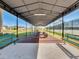 The community workout equipment under a covered gazebo with views of the lake at 824 Spring Island Way, Orlando, FL 32828