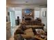 Inviting living room area with brick fireplace and ample seating at 8539 Clematis Ln, Orlando, FL 32819