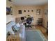 Home office with desk and daybed, creating a comfortable and productive workspace at 8539 Clematis Ln, Orlando, FL 32819