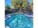 Beautiful pool surrounded by lush greenery, creating a relaxing outdoor space at 8539 Clematis Ln, Orlando, FL 32819