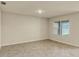 Bright, empty bedroom features large window and neutral tile flooring at 868 Brooklet Dr, Davenport, FL 33837