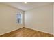 Bright bedroom with hardwood floors and a window with a view of the outside at 868 Brooklet Dr, Davenport, FL 33837