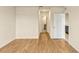 Bright bedroom boasts hardwood floors and a neutral palette, offering a serene retreat at 868 Brooklet Dr, Davenport, FL 33837